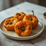 air fryer anaheim peppers: Golden blistered air fryer anaheim peppers with smoky char and glistening oil on a plate.