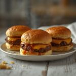 Air Fryer BBQ Beef Sliders: Juicy air fryer BBQ beef sliders with golden buns and melted cheese on a plate, perfect for Air Fryer Dinners.